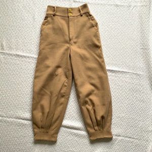 Free People cropped and pleated dress pant.